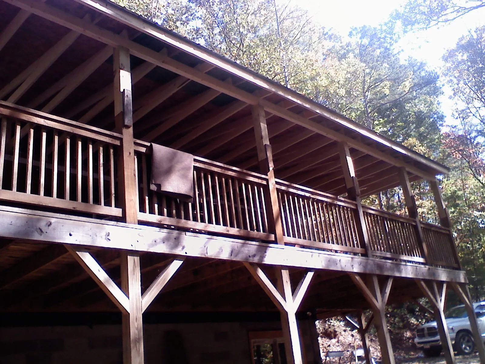 Timber framing under a new elevated porch and deck — Roof Leak Repair in Randallstown by Roofing Brothers